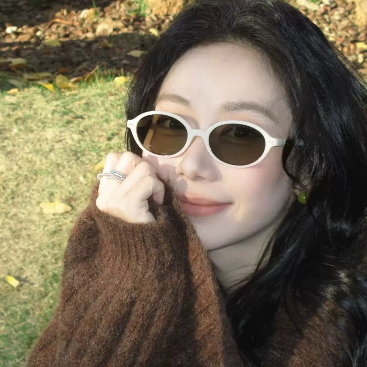 **Women's Brown Oval Frame Sunglasses with UV Protection**