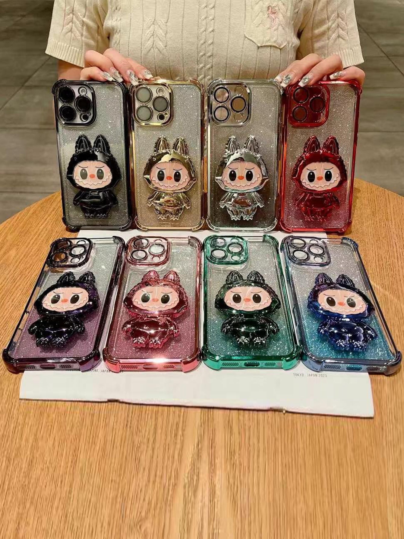 iPhone phone case four-corner anti-fall pull cloth electroplated magnetic bracket