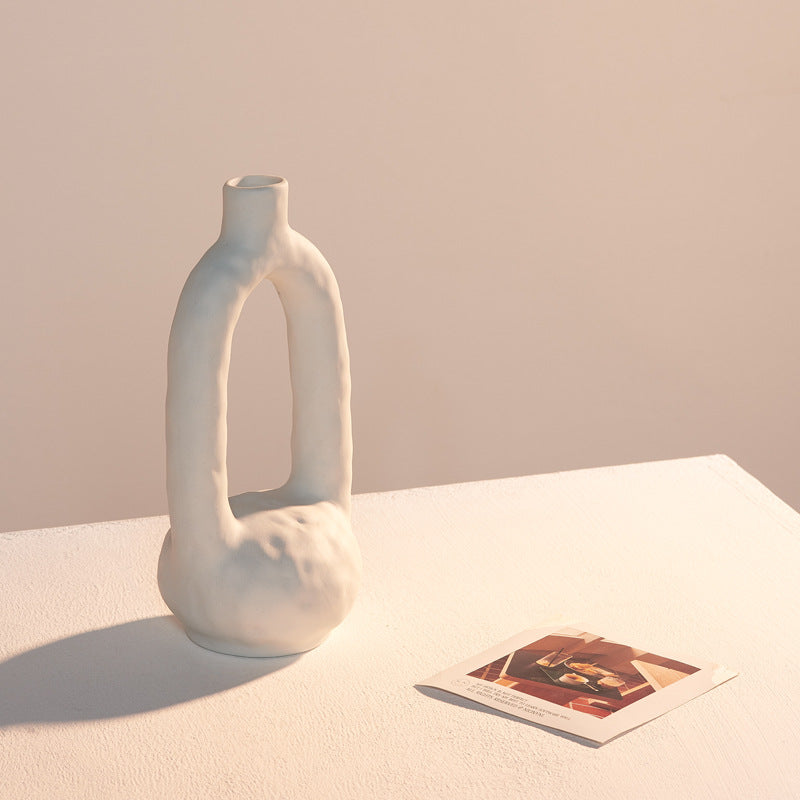 Artistic unglazed ceramic vase