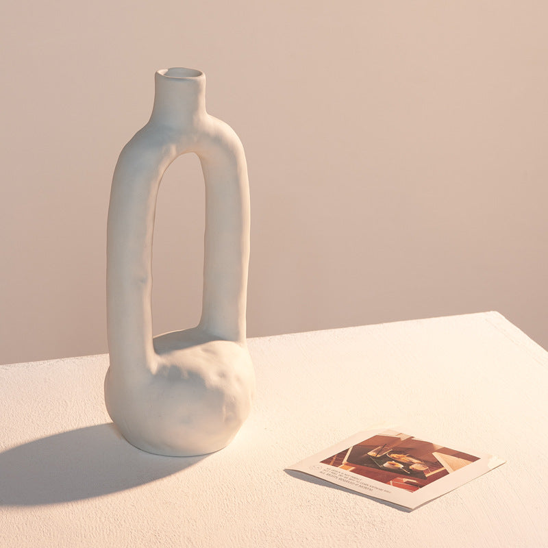 Artistic unglazed ceramic vase