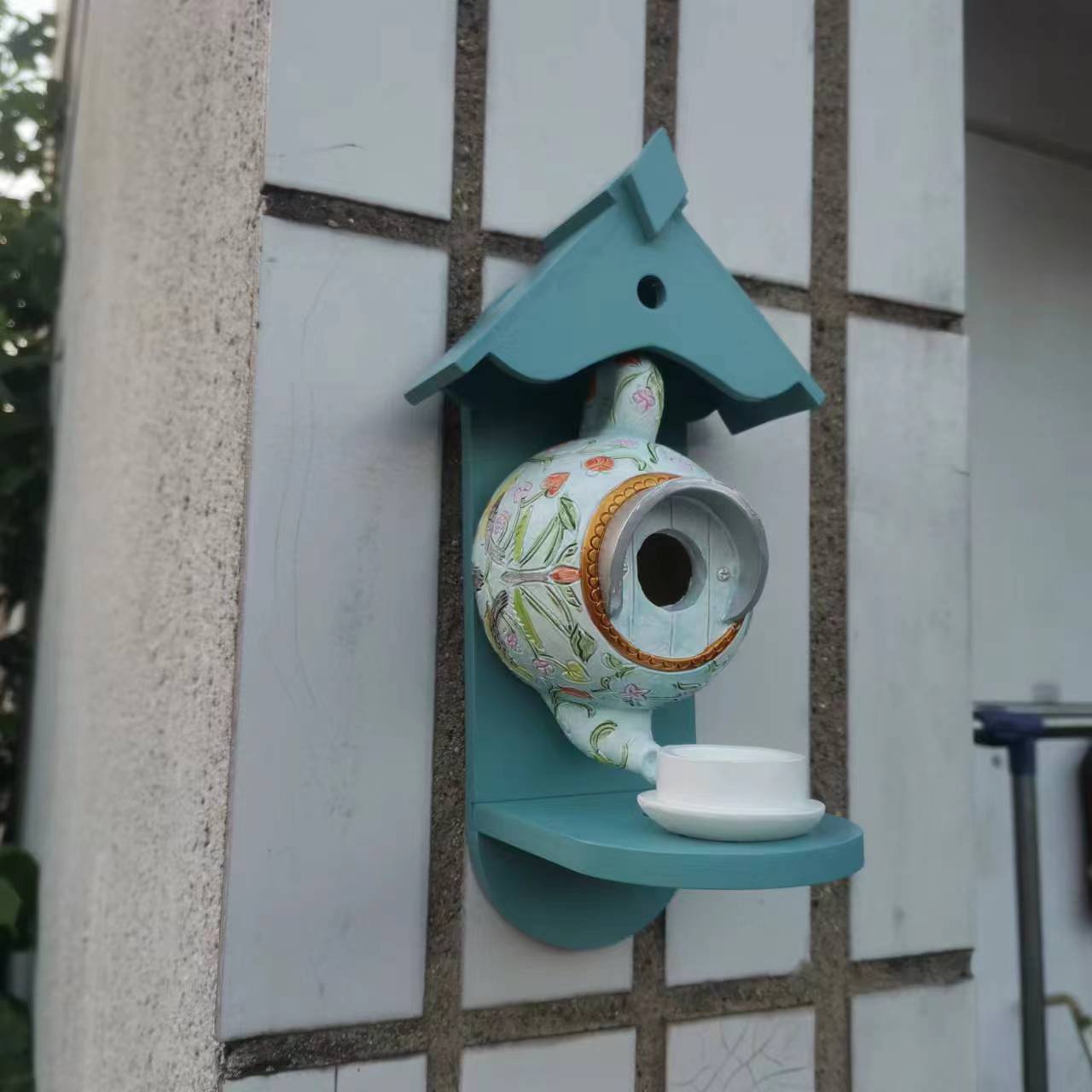 **Teacup Birdhouse and Feeder for Patio Decoration**