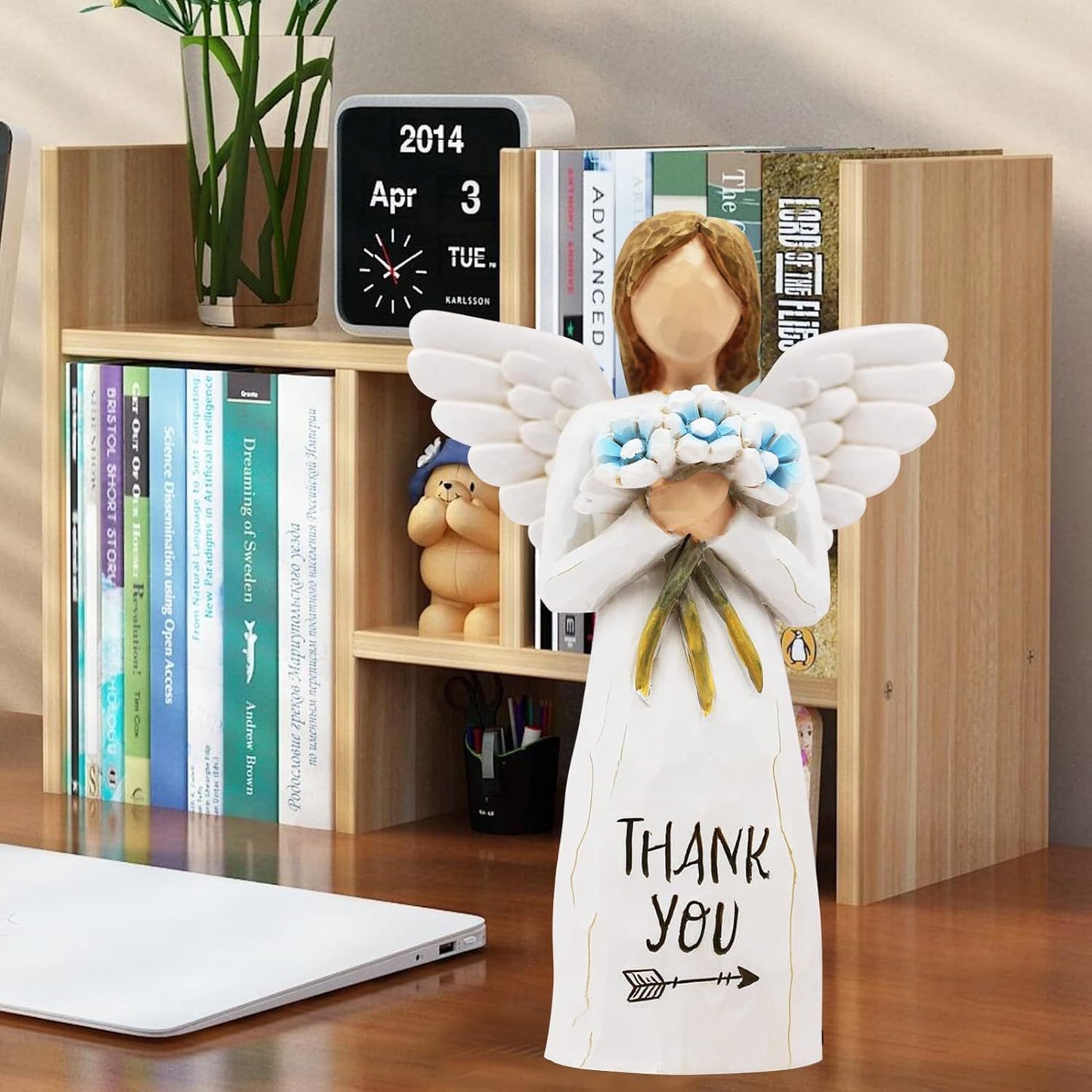 Angel with Wings Holding Flowers Sculpture