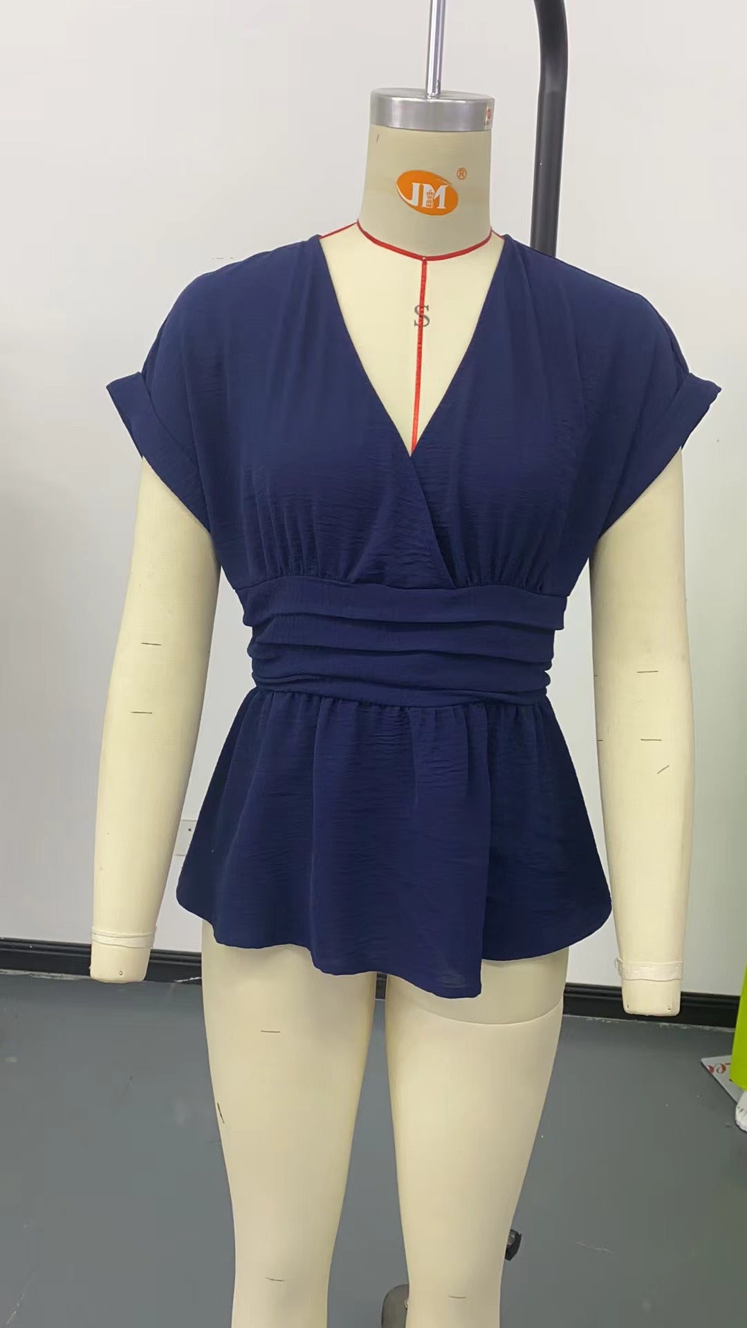 V-neck, fitted waist, raglan sleeve, pleated skirt T-shirt