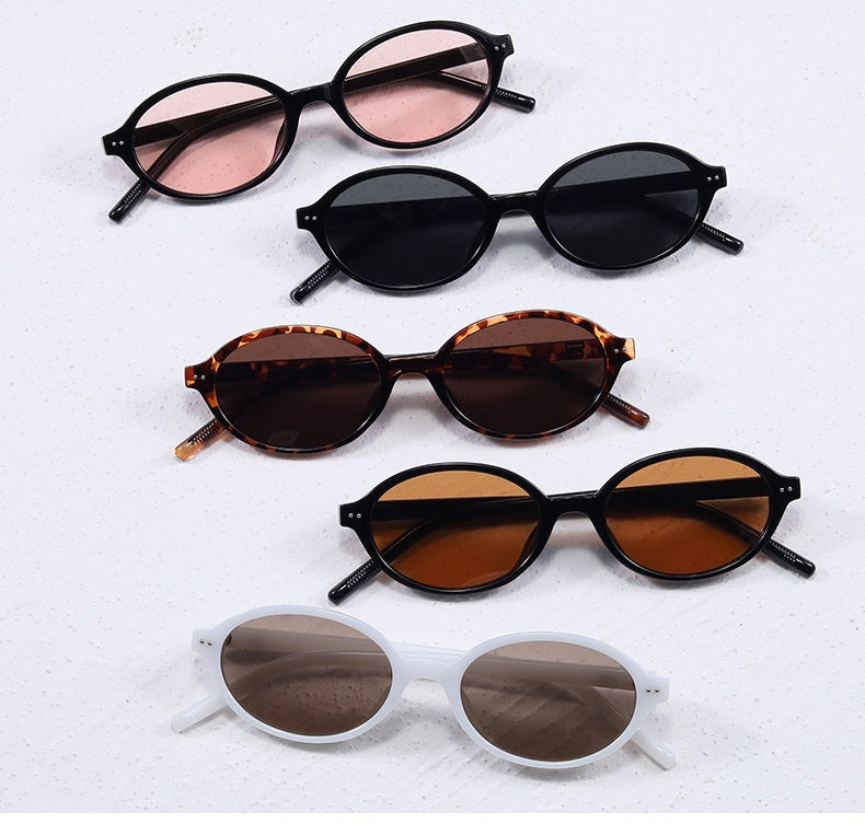 **Women's Brown Oval Frame Sunglasses with UV Protection**
