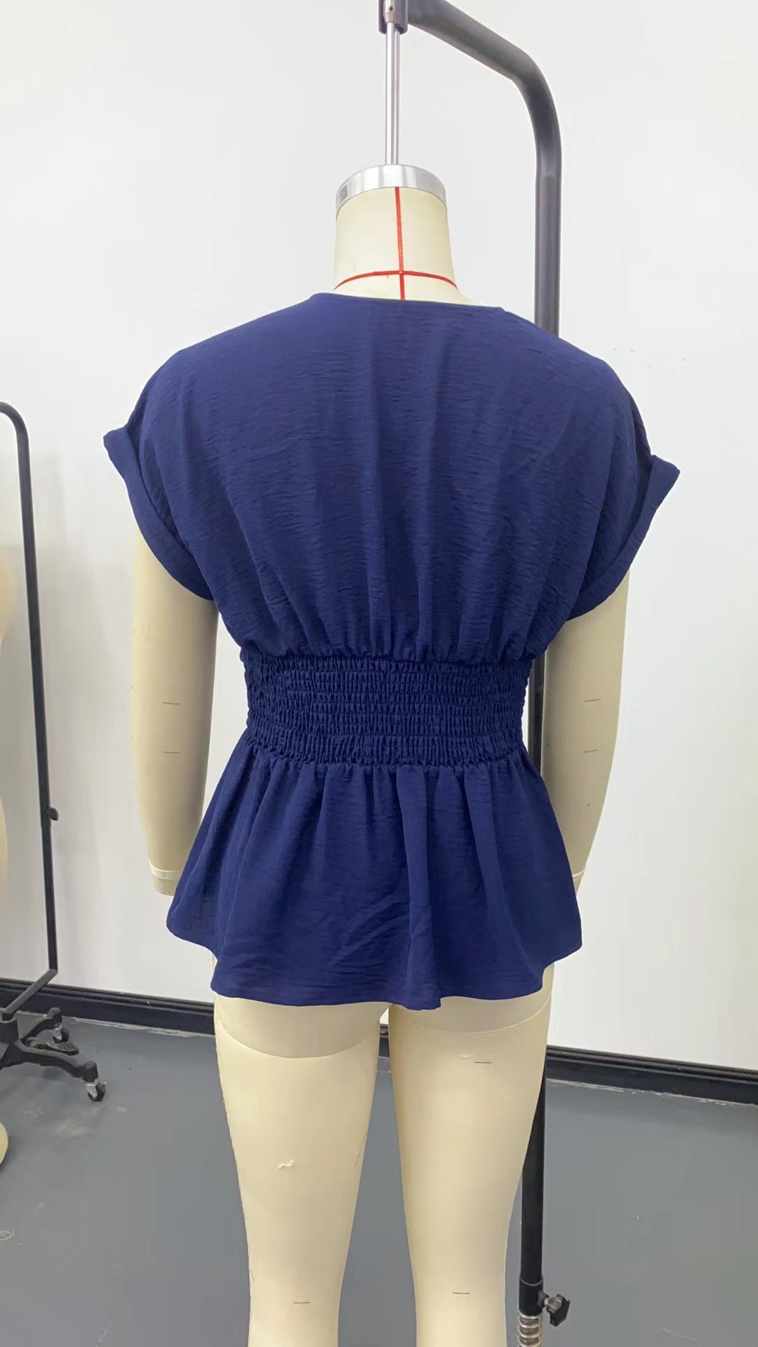 V-neck, fitted waist, raglan sleeve, pleated skirt T-shirt