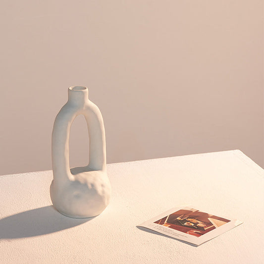 Artistic unglazed ceramic vase