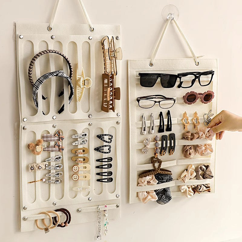 Wall-mounted storage bag behind the door