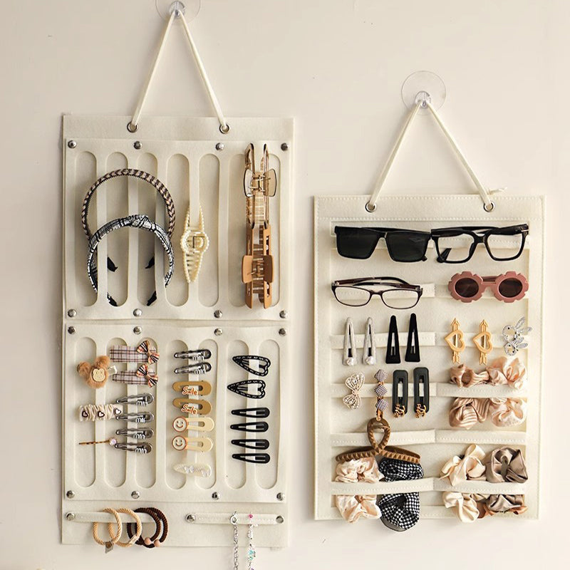 Wall-mounted storage bag behind the door