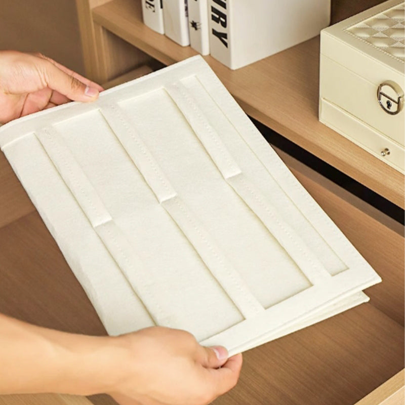 Wall-mounted storage bag behind the door