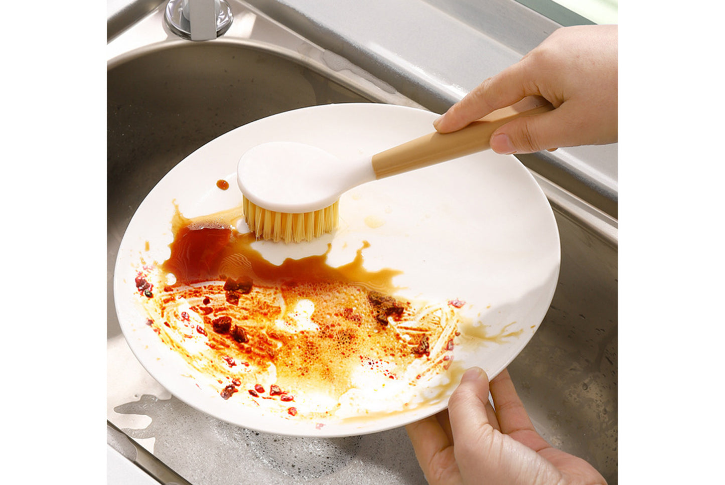 Non-stick dishwashing artifact