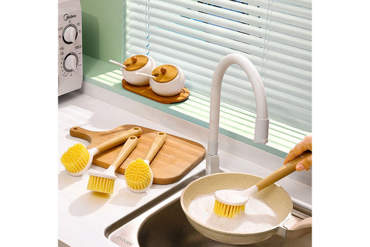 Non-stick dishwashing artifact