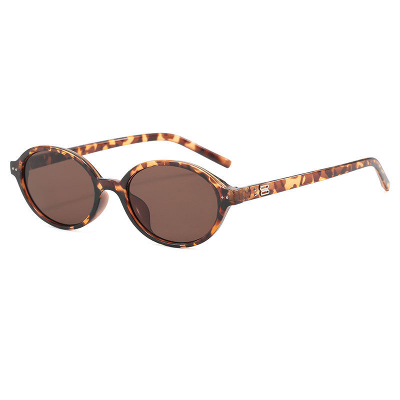 **Women's Brown Oval Frame Sunglasses with UV Protection**
